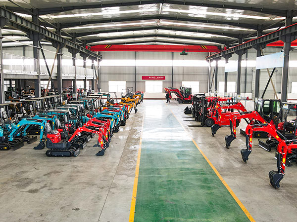 Orange machinery arranged in the production workshop